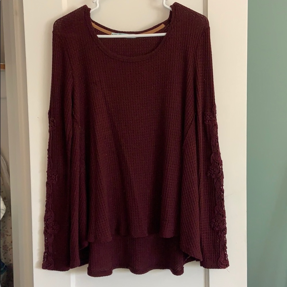 Lightly used,maroon long sleeve, size medium